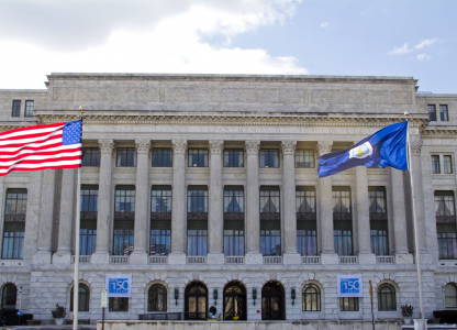 Department,Of,Agriculture,Office,Building,,American,Flag,Flapping,,In,Washington Department of Agriculture office building, American flag flapping, in Washington DC, United States